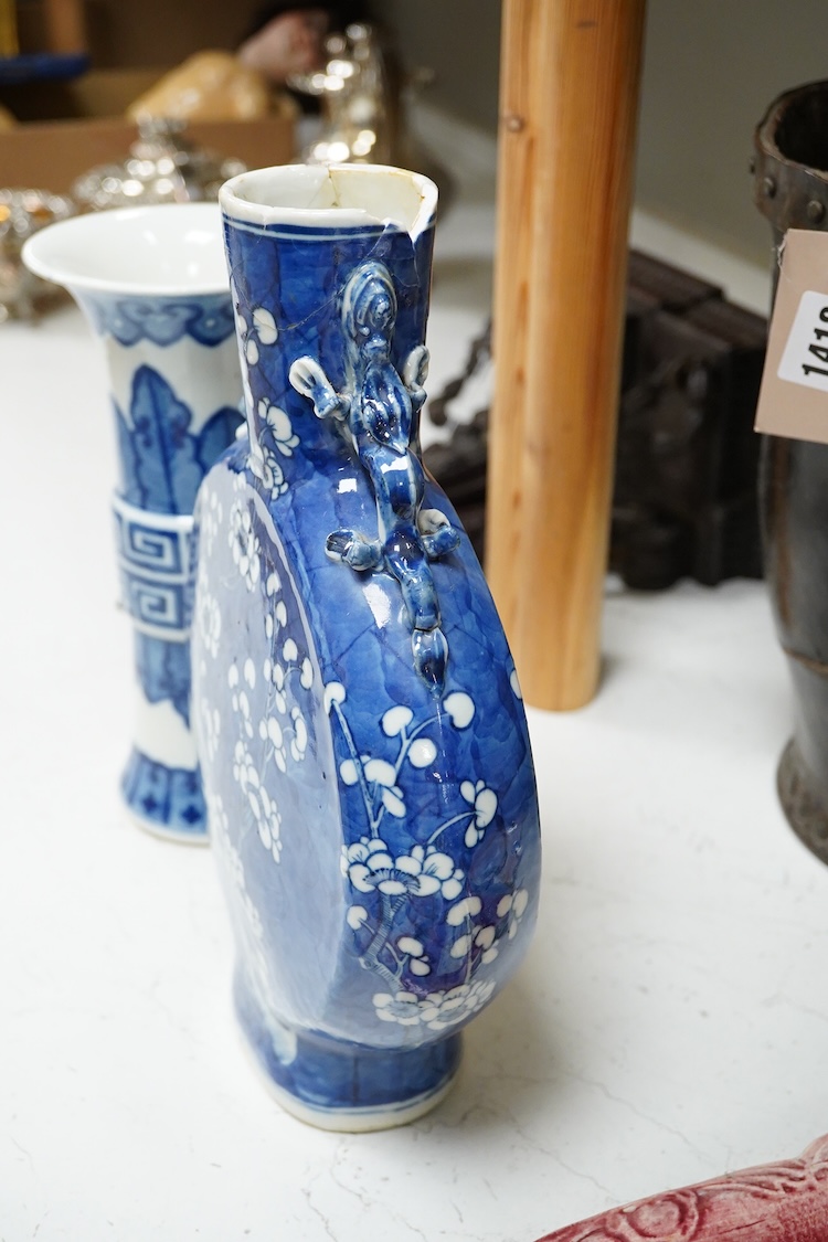 A Chinese blue and white prunus flower moon-flask and a Gu vase, largest 30cm high